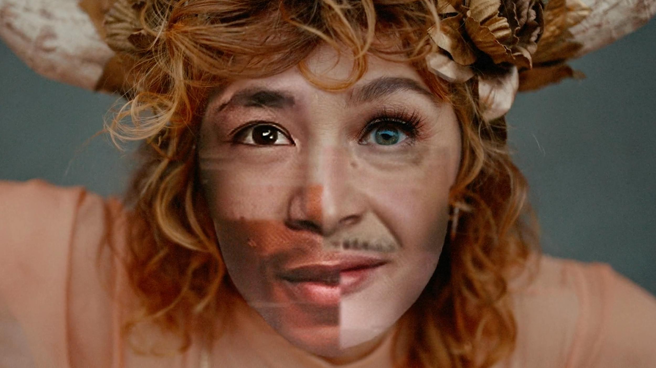 Surreal close-up of a woman with a digital face-blend effect. Conceptual post-production visual effects and creative makeup for avant-garde music videos or experimental film projects.