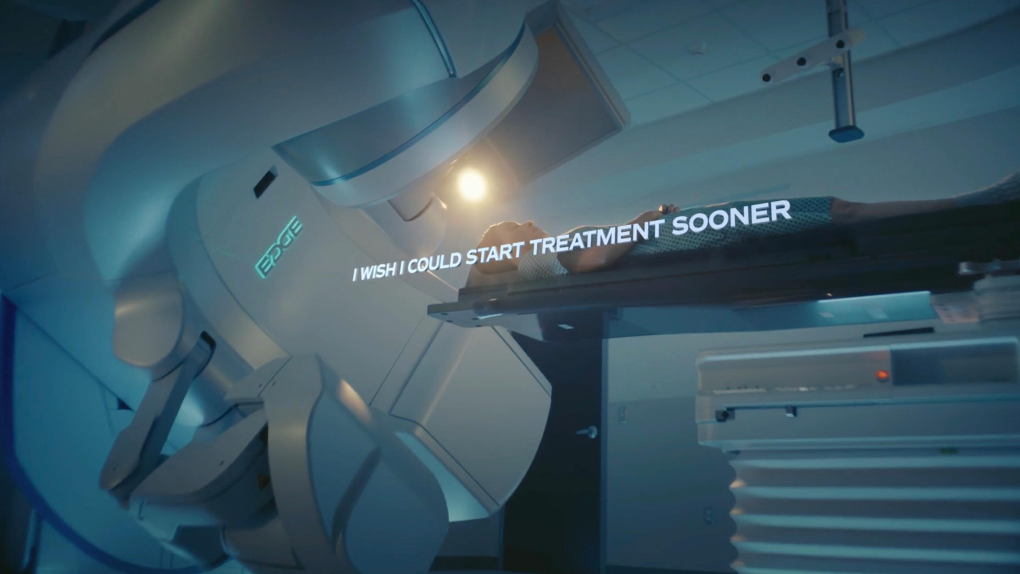 A low-angle Dutch tilt shot of a high-tech medical or research facility. The scene is bathed in cool blue and teal color grading with a bright, clinical key light striking a metallic surface