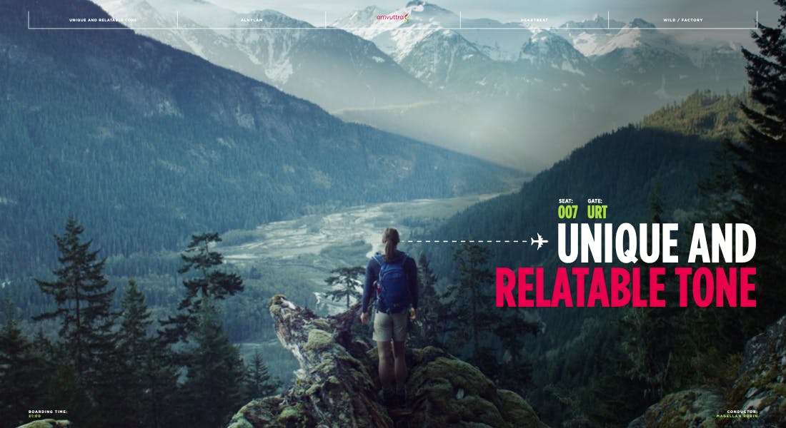 Person standing on a mountain overlook beside campaign text on a virtual productions page by a creative video agency