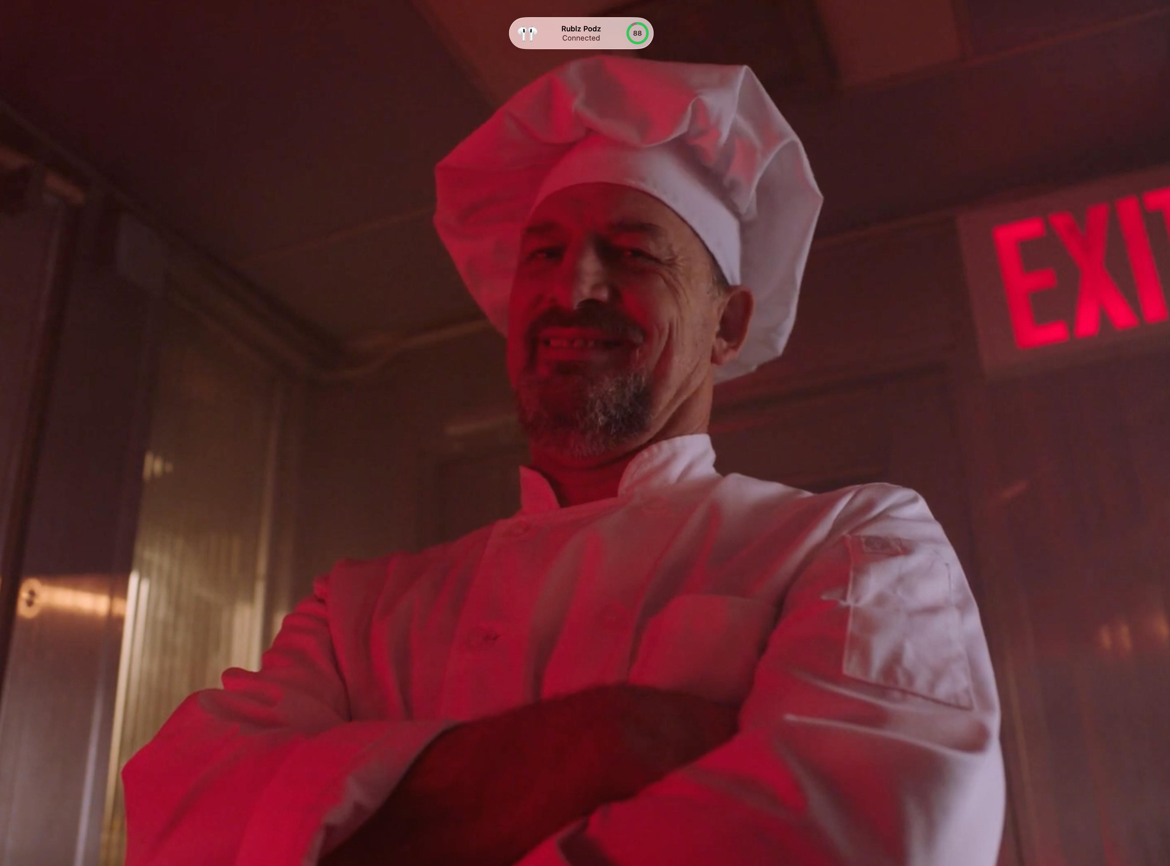 Man in a chef uniform from the MICHAA Women’s Tales fashion brand film