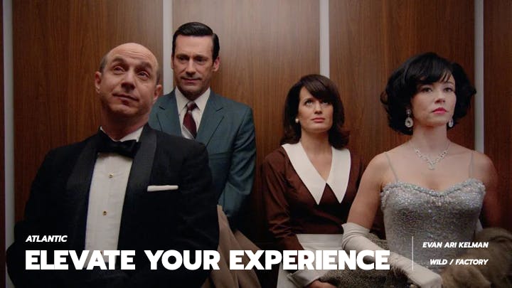 Stylish group portrait in an elevator for a realtor NYC ad partner campaign by a commercial video production company