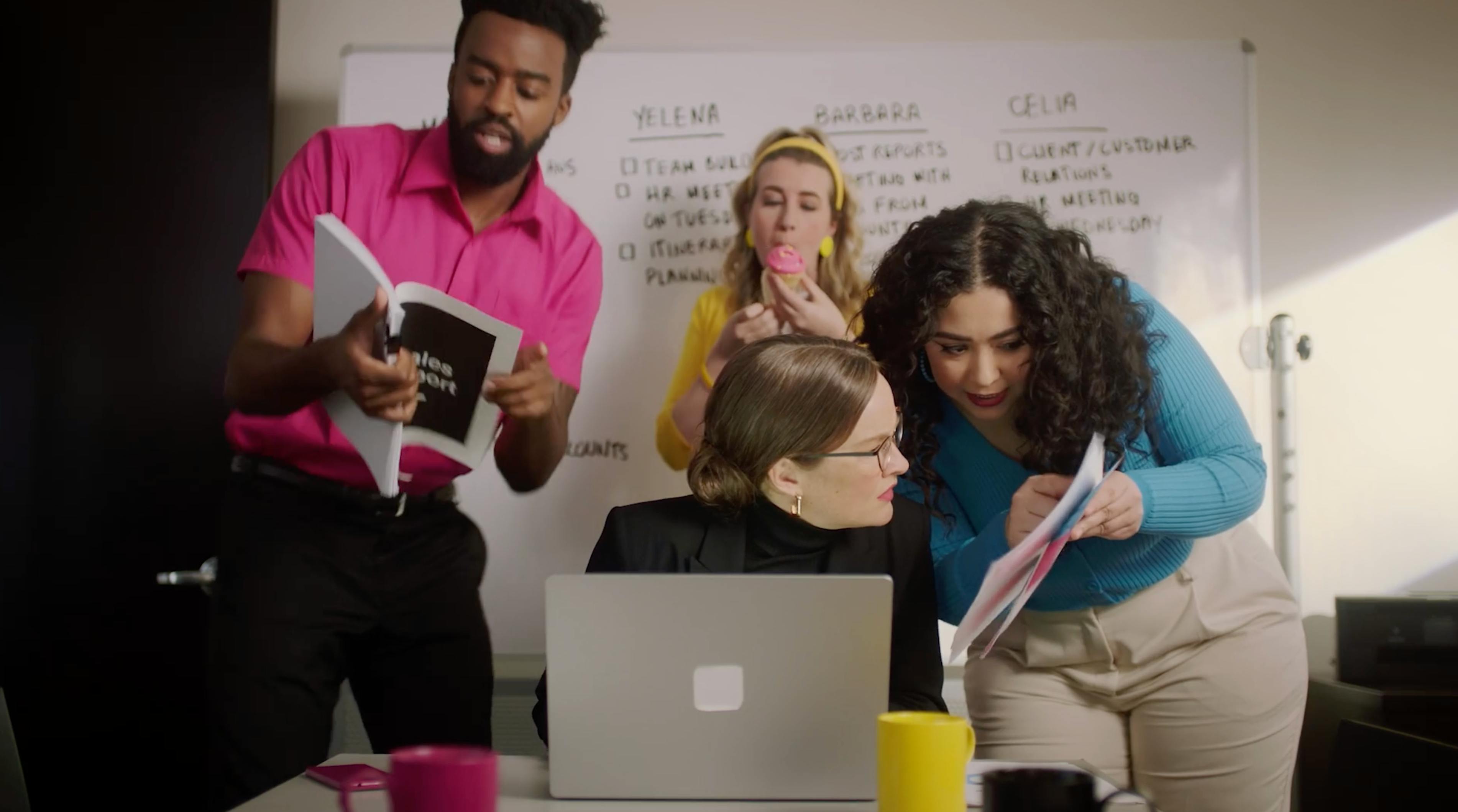 Branded series team scene around a laptop from the New York episodic branded content production.