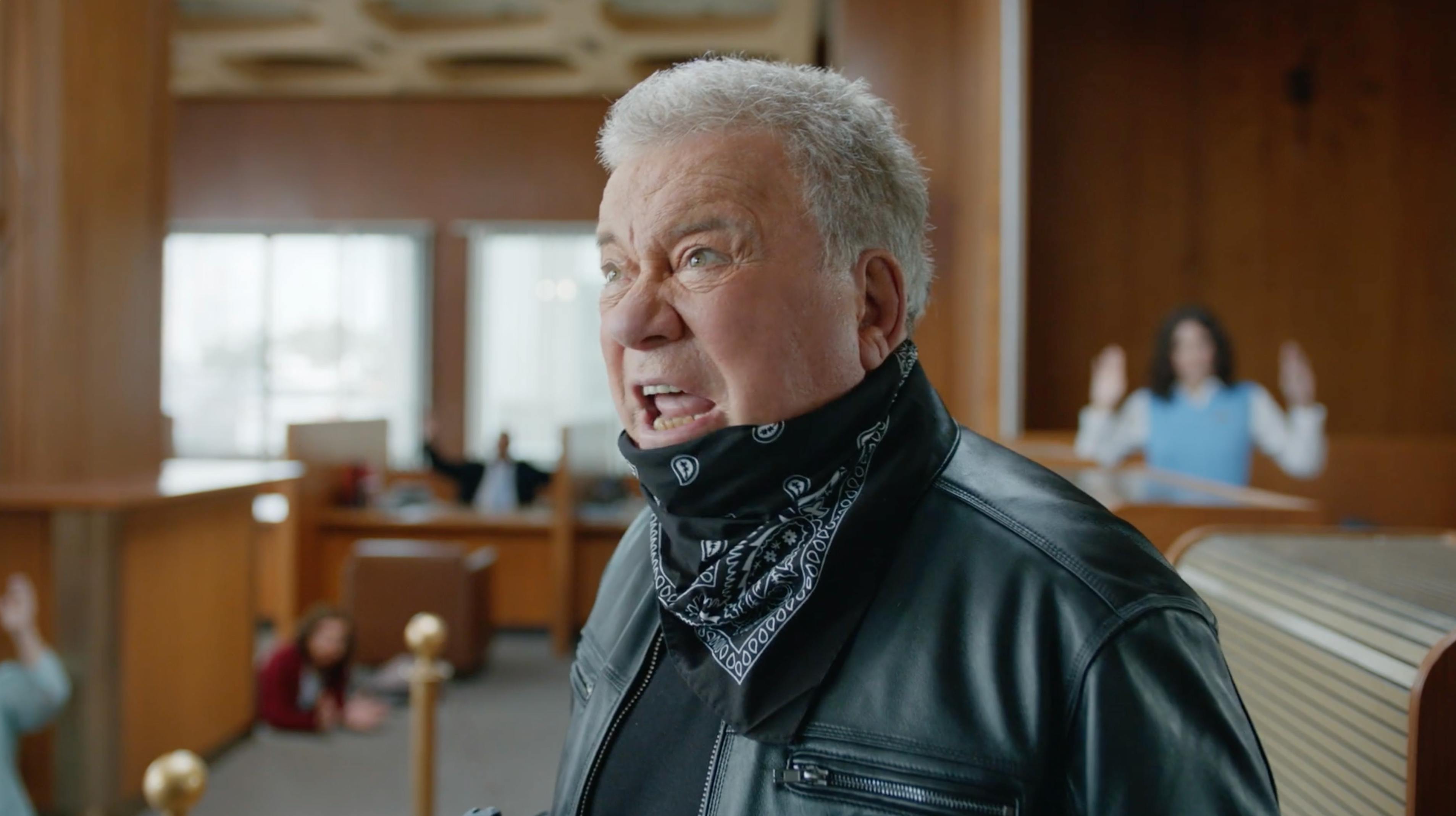 William Shatner speaking in a courtroom-style set for a branded episodic content video producer campaign