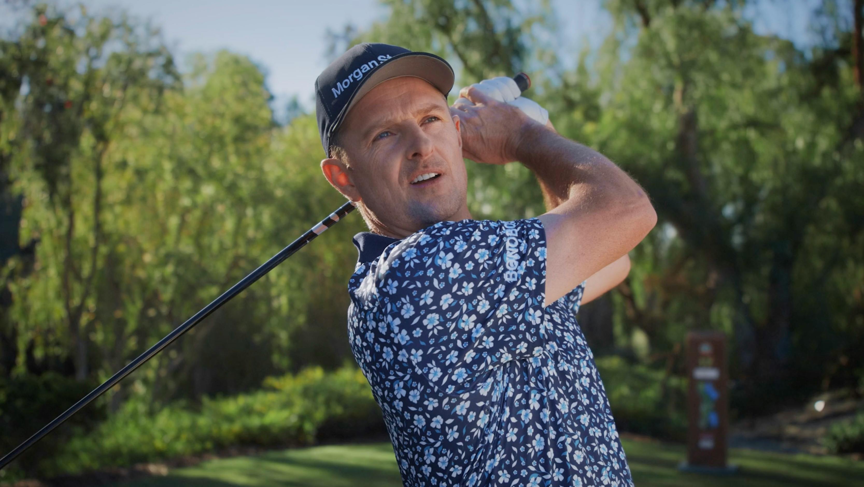 Golfer mid-swing on a sunny course in a California live action TV production by a commercial video production company